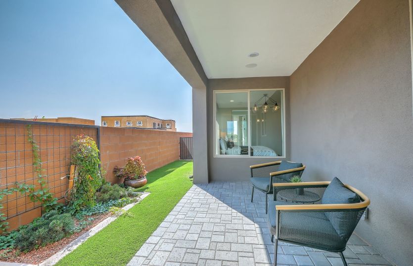 An added covered patio enhances your outdoor living experience on the townhomes in Prado
