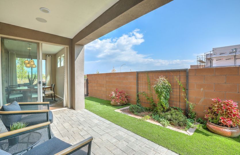 The yard and covered patio of the Ocotillo home design create a very easy-to-maintain outdoor mainte