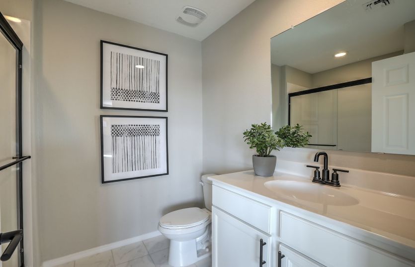 Guest bathroom on the second floor serves the secondary bedrooms.