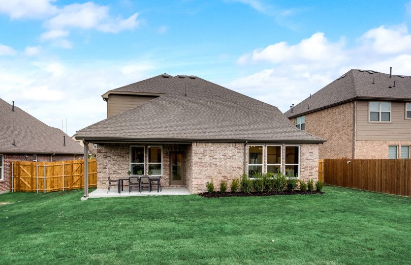Spacious, fenced-in backyard *model representation