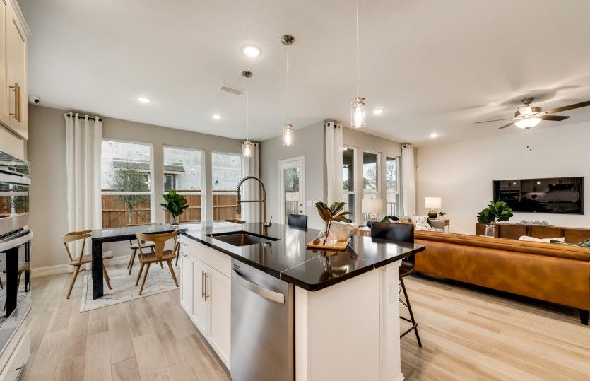 Large kitchen island with views of the gathering room