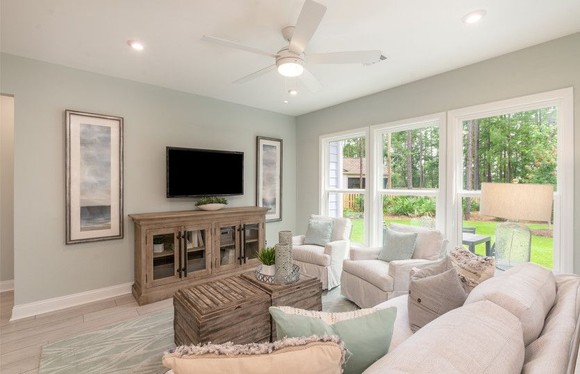 Large gathering room with views of the backyard