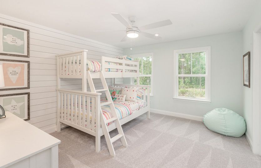Guests will enjoy the secondary bedroom with ample room