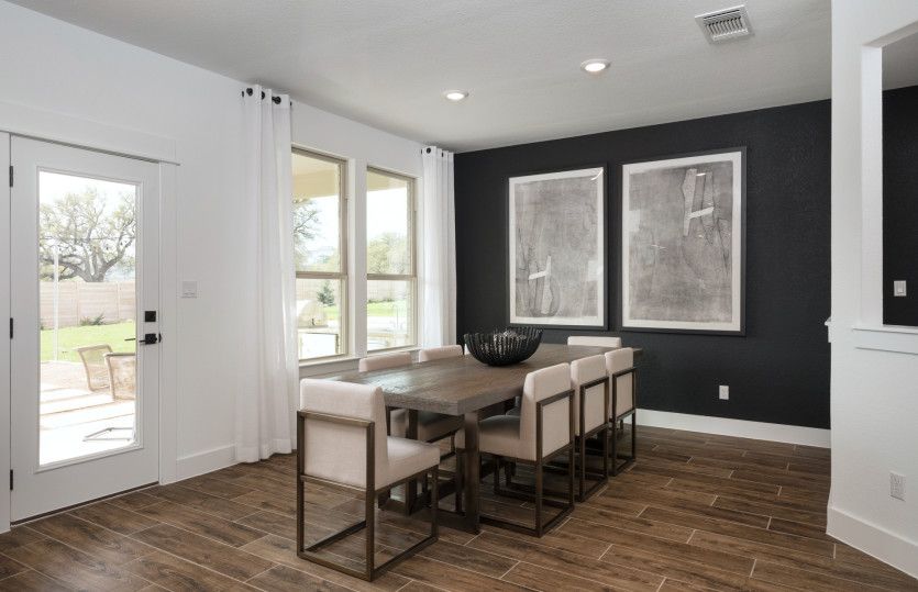Spacious Dining Space with Backyard Patio Views