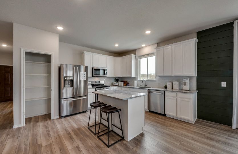 Island kitchen with recessed lighting