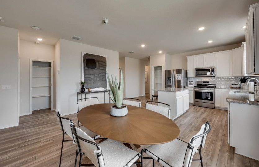 Dining area with view of kitchen