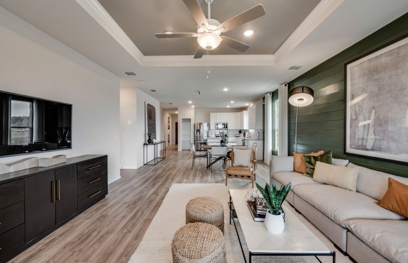 Gathering room with view of kitchen and dining areas