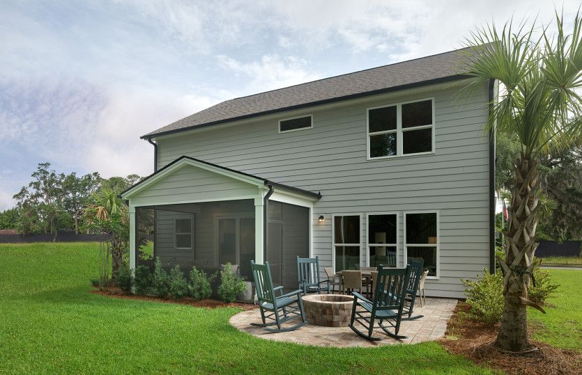 Spacious screened in porch and fire pit on the patio to gather and relax with friends.