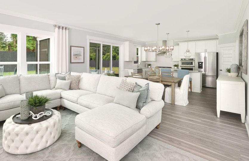 Large gathering room that looks over the dining and kitchen areas