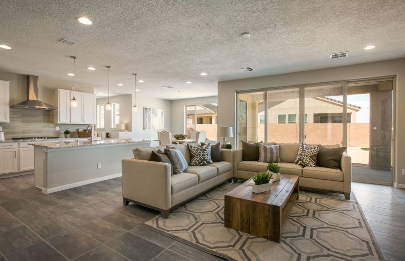 Enjoy open living spaces on the first floor of the Trento home design.