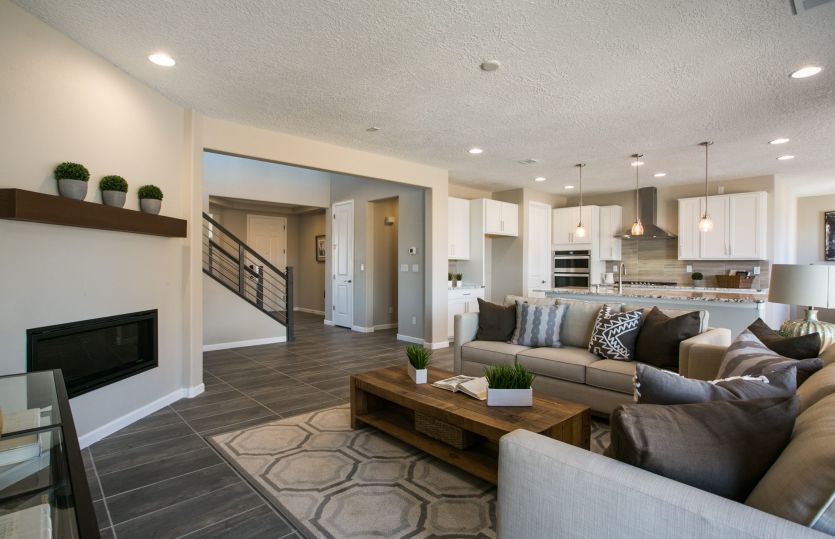Accent your gathering room with a corner fireplace with mantle for a cozy ambiance to your gathering