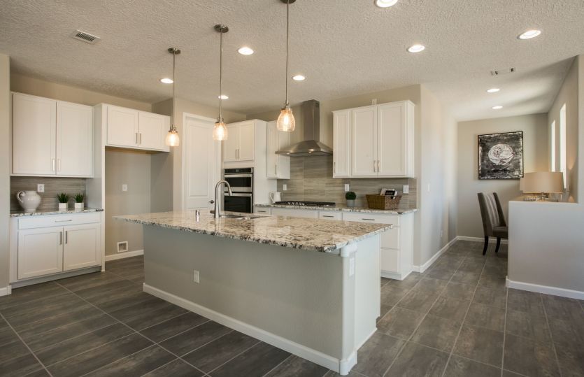 Enjoy cooking, baking, and making memories in your new kitchen with Pulte Planning Center® convenien
