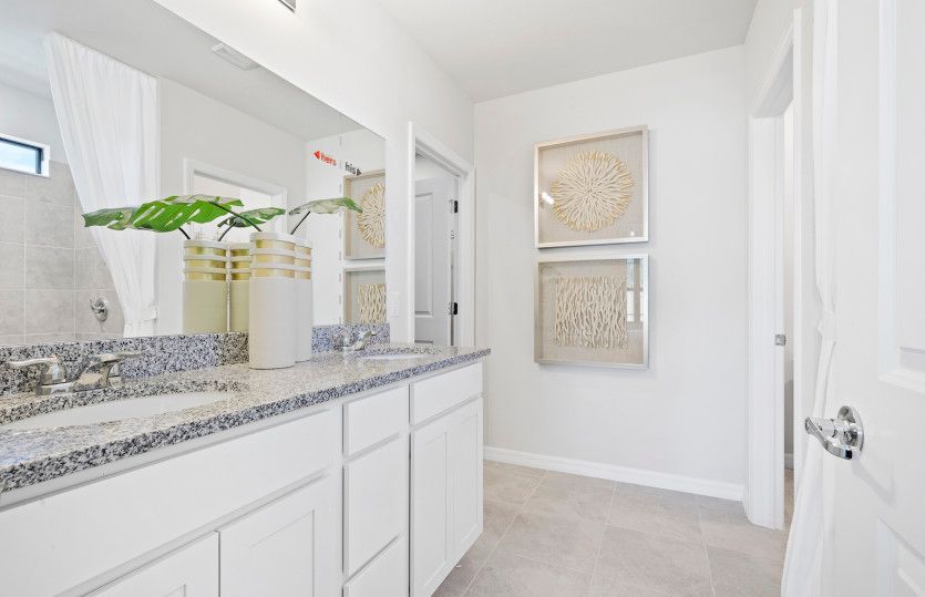 Owner's bathroom with dual sink vanity