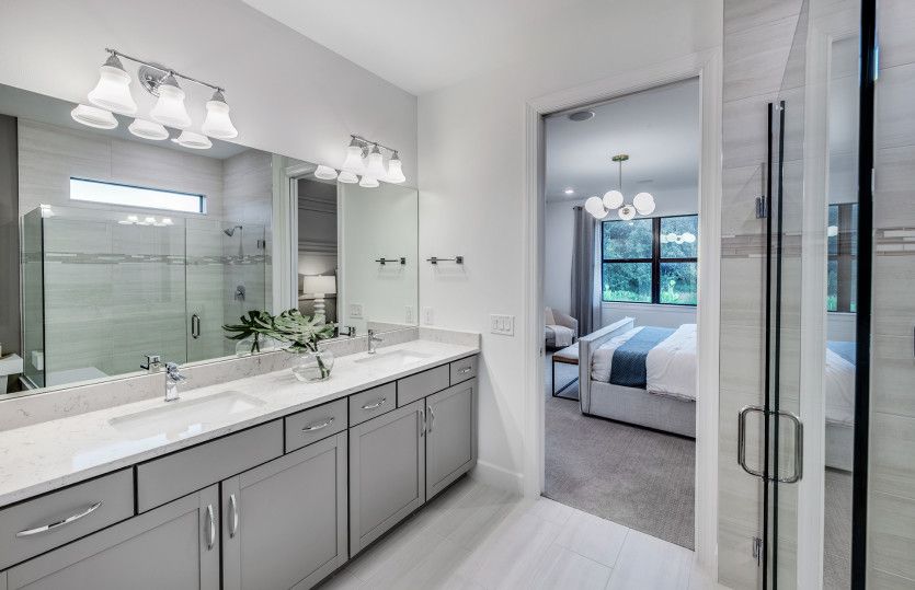 Luxurious owner's bath with dual-sink vanity