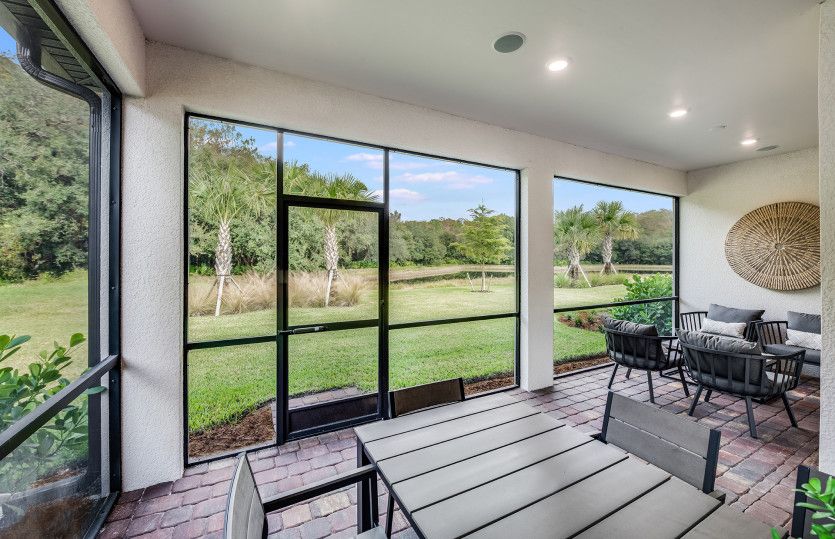 Screened-in lanai with views of nature