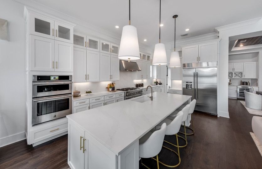 Thoughtfully designed kitchen with built-in appliances & cabinets and oversized island