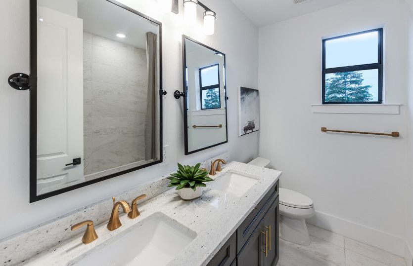 Secondary bathroom with dual sink vanity