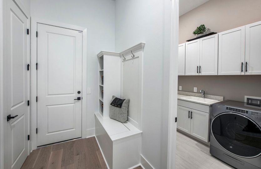 Laundry and optional drop zone at garage entry