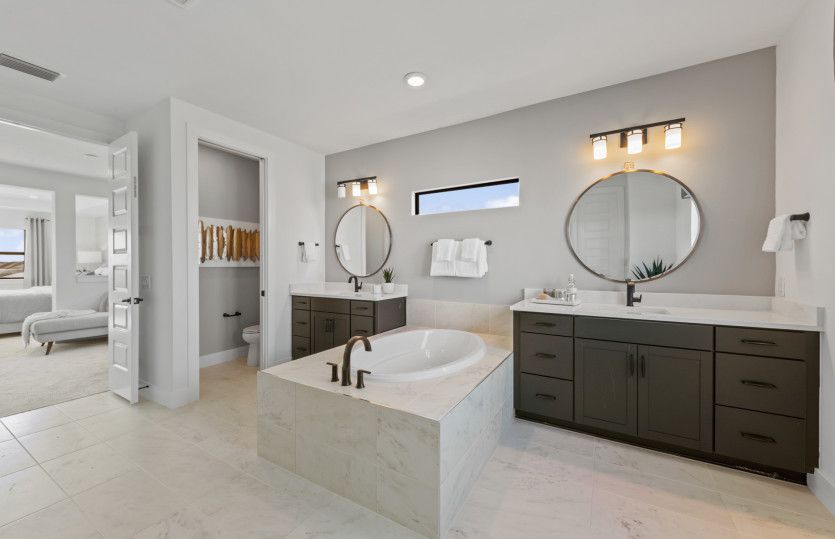 Luxuriously appointed owner's bath with optional tub