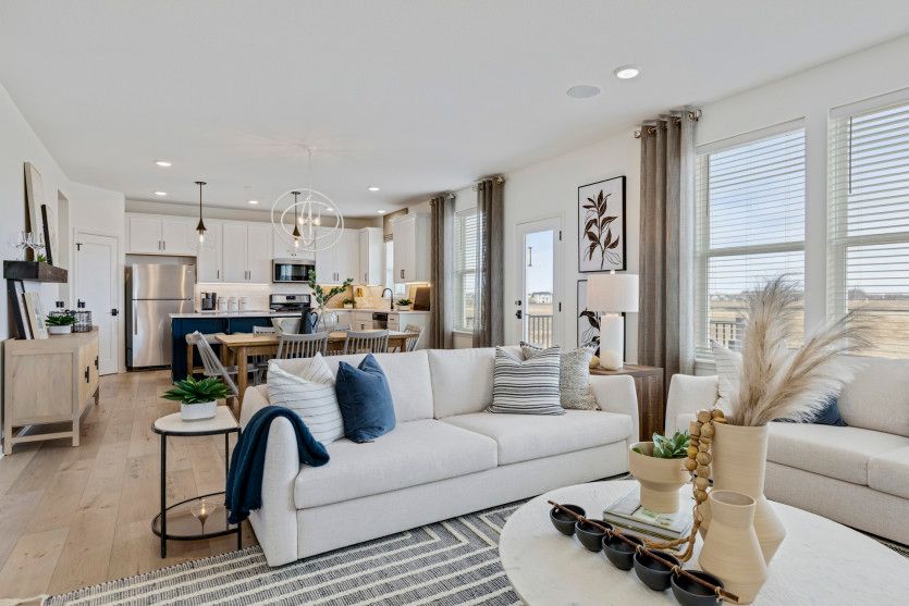 Open Concept Layout Featuring Gathering Room, Dining Room and Kitchen