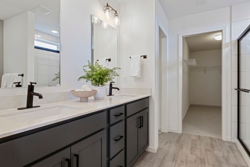 Large Owner's Bath with Two Vanities and Separate Tub/Shower
