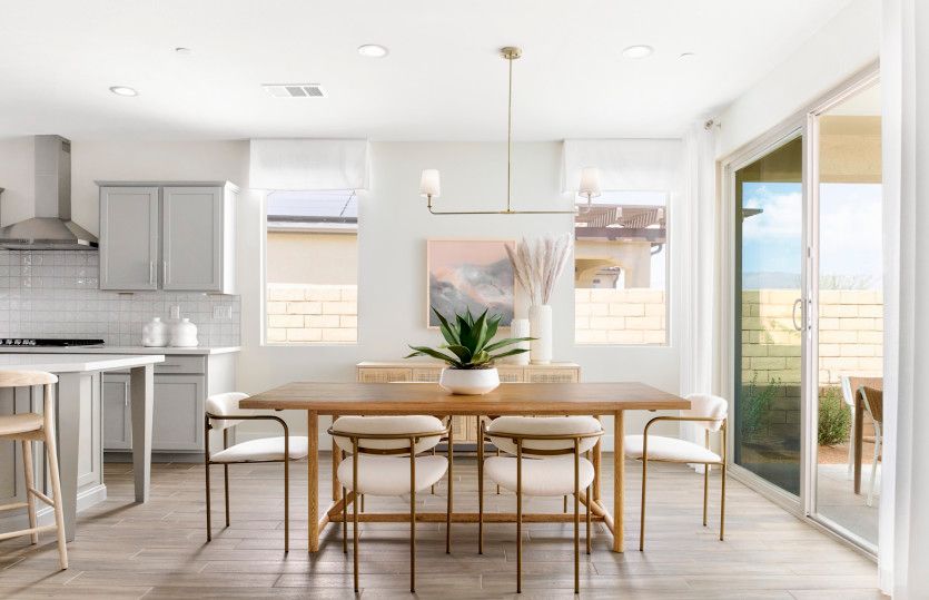 Café just off the kitchen offers easy access to the backyard.