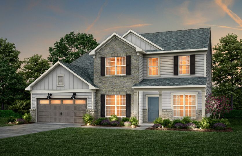 Riverton Exterior 5 features brick, siding, covered front sitting porch and 2 car garage