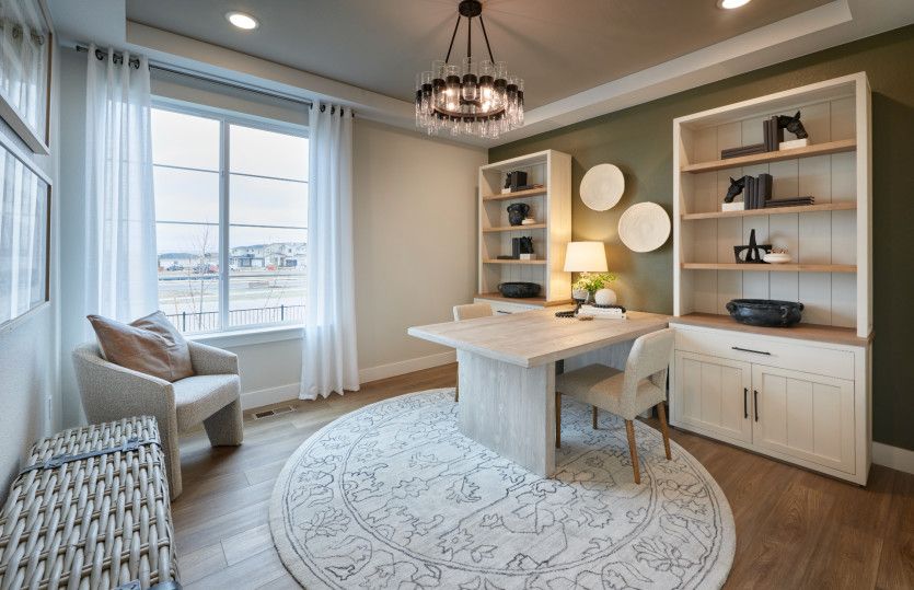 Off the entrance to the Quincy you'll find a spacious den/flexible living space.