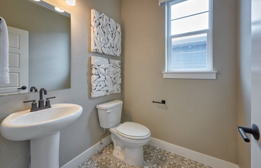The downstairs features an additional half bath.