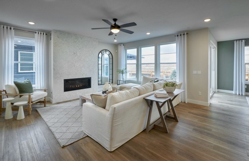 Relax each day in the Quincy gathering room shown with an interior fireplace.