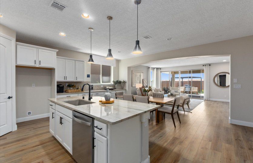 The open concept of the Barletta seamlessly connects the kitchen, café, and gathering room.