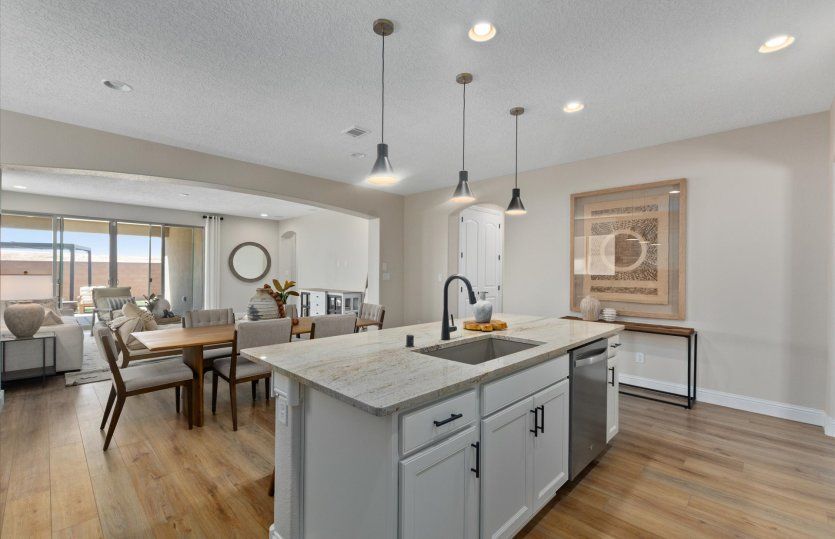 Cleanup after meals is a breeze with the island sink and dishwasher.