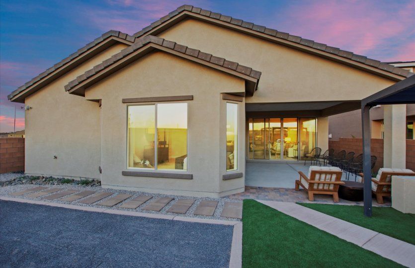Outdoor entertaining is a breeze with the versatility of the covered patio and spacious backyard.