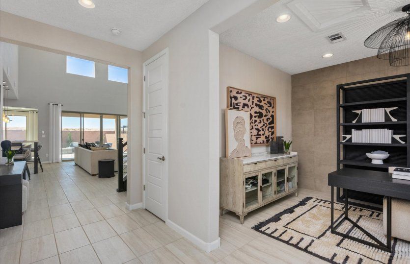 Right off the entrance, you'll find a spacious den.