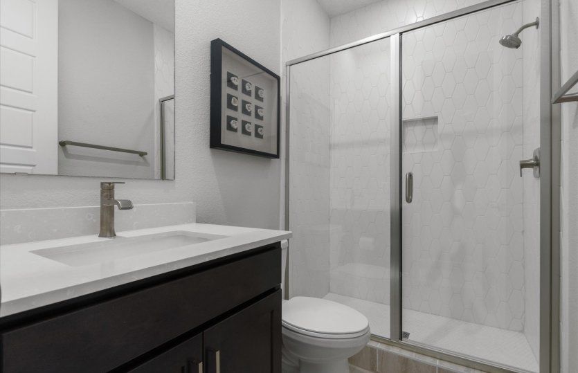 Choosing the optional downstairs bedroom adds an additional downstairs bath for guests to use.