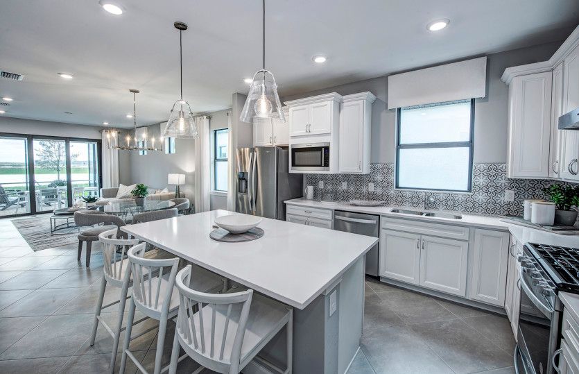 Kitchen with large center island and stainless steel appliances