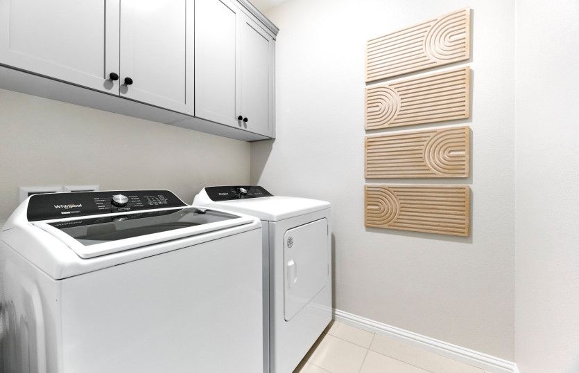 Modern laundry room with plenty of storage