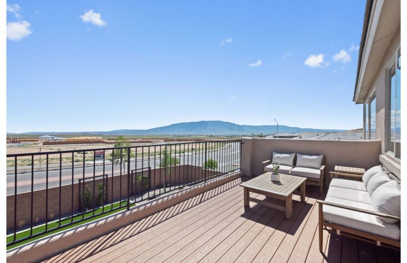 Large balcony off owner's suite offers picturesque views.
