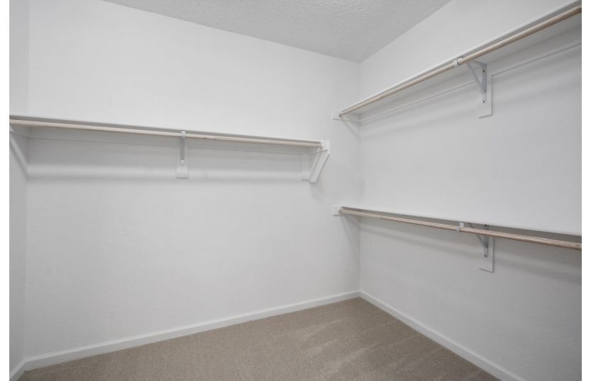 Enjoy plenty of space for storage in the walk-in closet attached to the owner's bath.