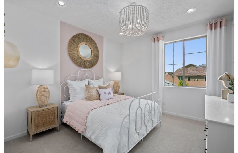 Large carpeted bedrooms that can be used for a nursery or guest bedroom.