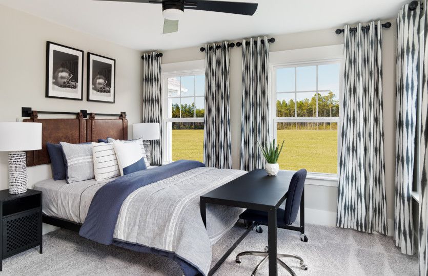 Additional spacious bedrooms with a walk-in closet.