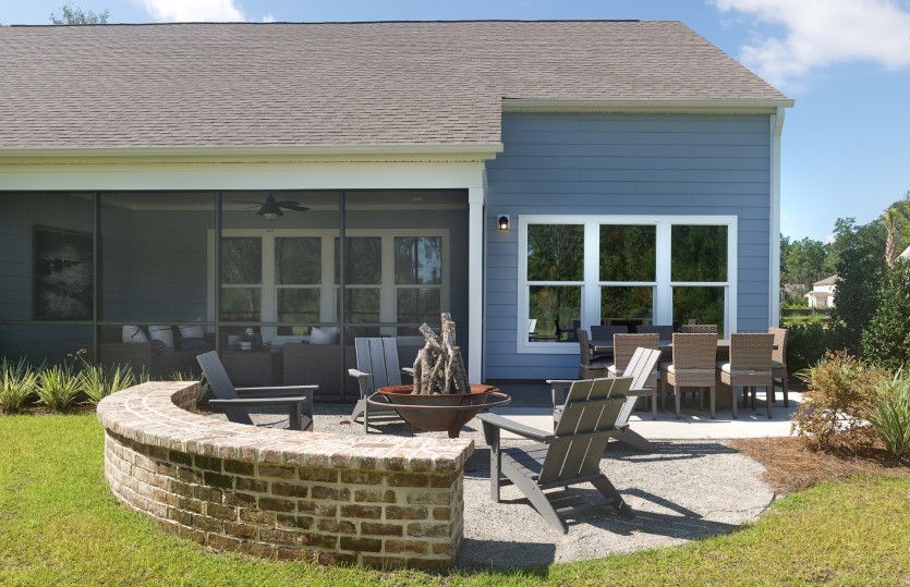 Get cozy on the patio and roast marshmallows at the firepit in your new home's backyard.