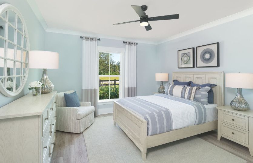 The secondary bedroom is perfect for guests to unwind during their visit.