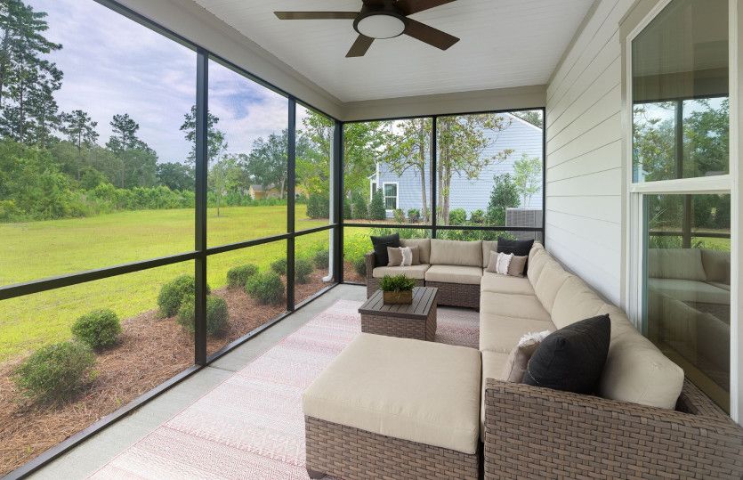 Expand your living space with a screened porch and watch the sunsets in the backyard.