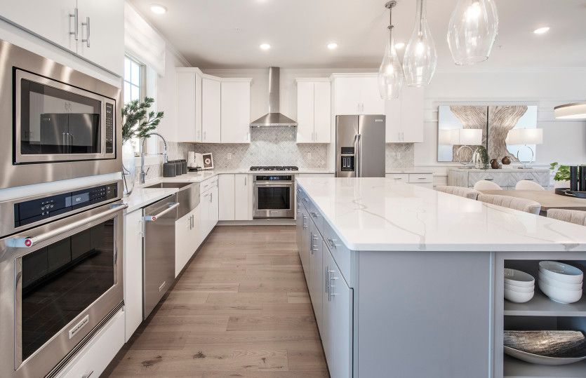 Rear kitchen with oversized countertop for extra seating
