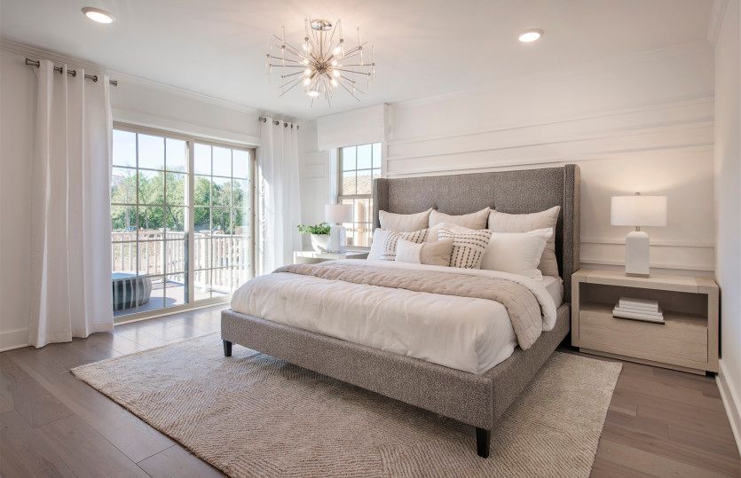 Owner's suite with large windows for natural light
