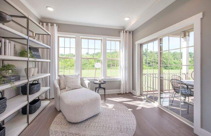 Optional rear extension adds sunroom off of kitchen