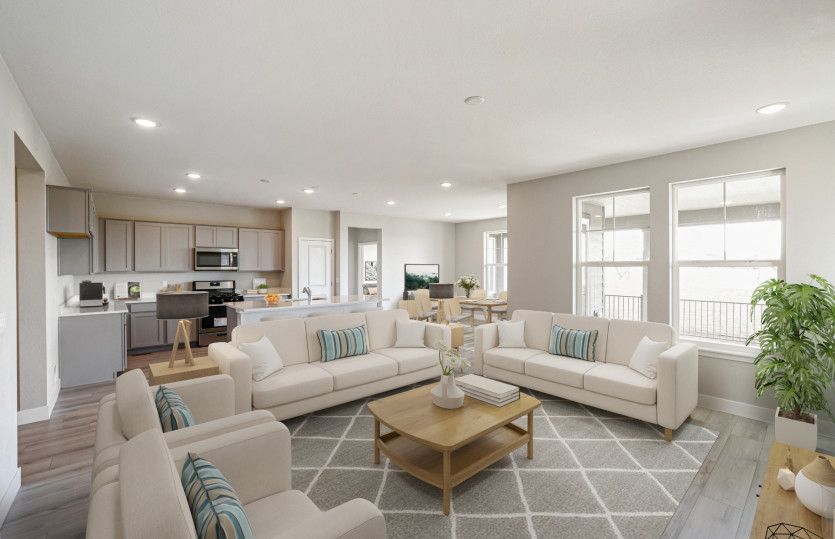 The Brownstone features an open floor plan that seamlessly connects the gathering room, kitchen, and
