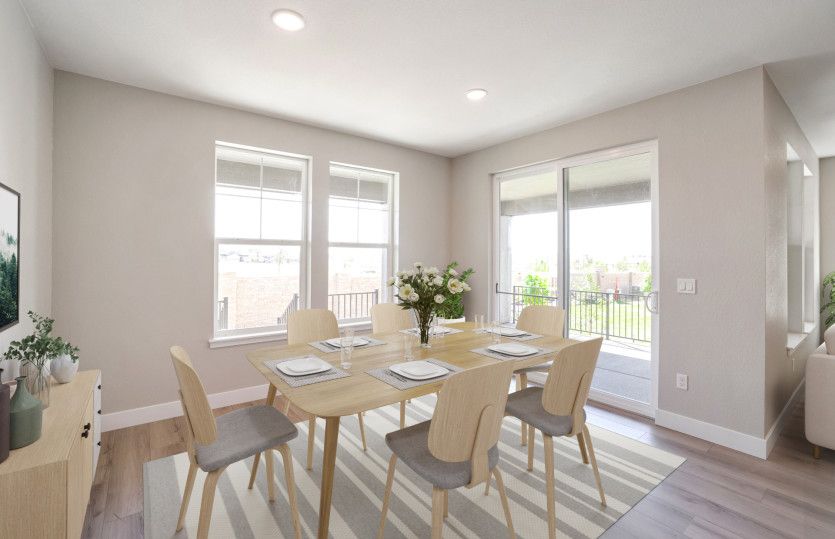The café is brightly lit thanks to the large window and sliding glass door to the backyard.