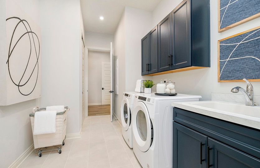 Large Laundry Room with Pass Thru to Owner's Closet